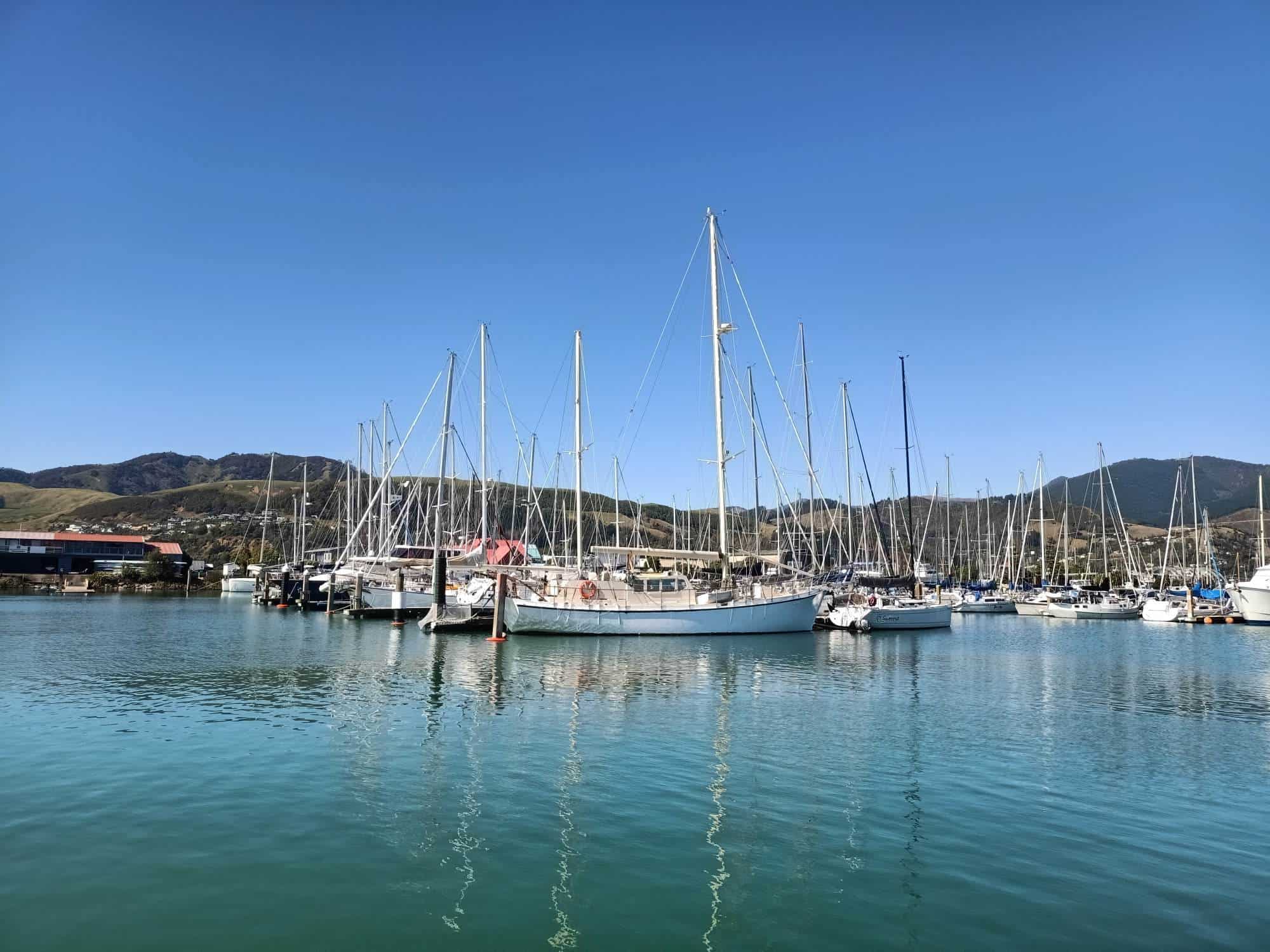 View boats in Nelson Marina.  A large yacht is in the foreground.