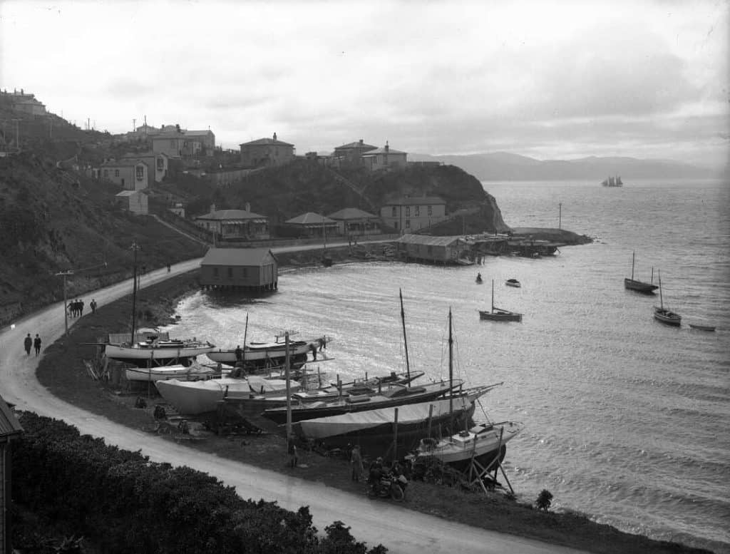 Black and white image of Boats at Balaena Bay, Wellington in 1912. They include the yacht Wylo