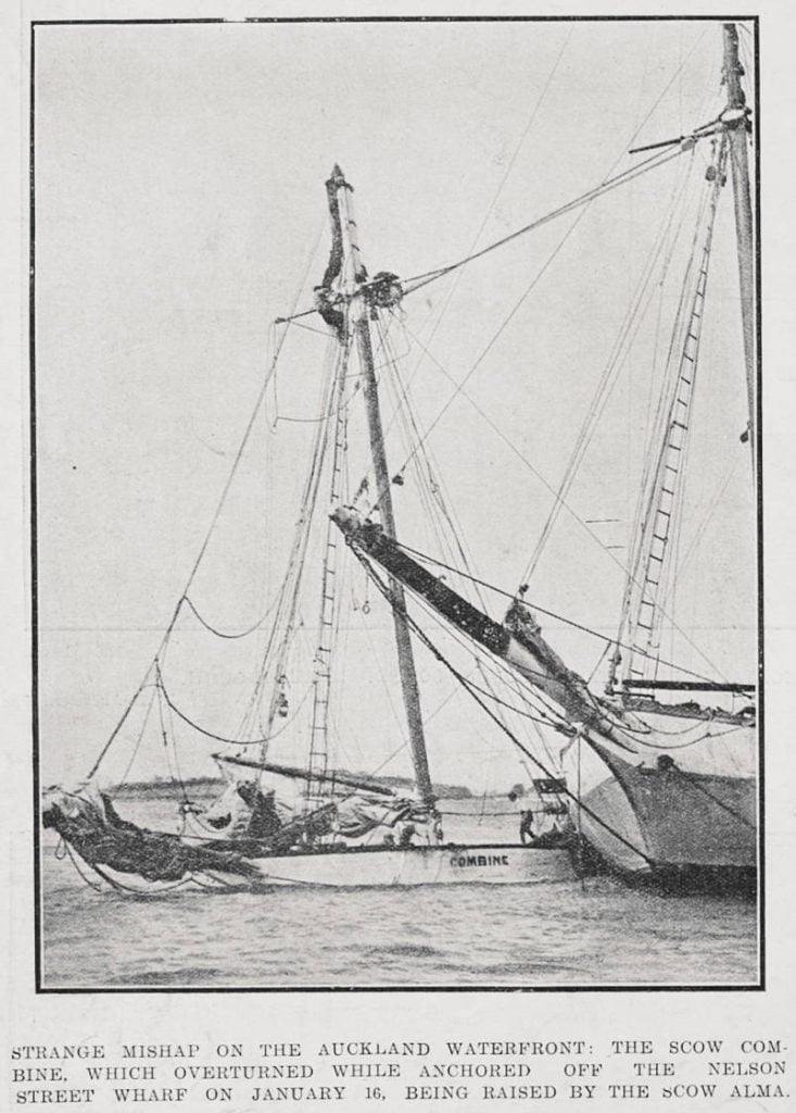 Image of an extract from a newspaper showing a photo of the scow Alma raising the boat Combine after it sunk.