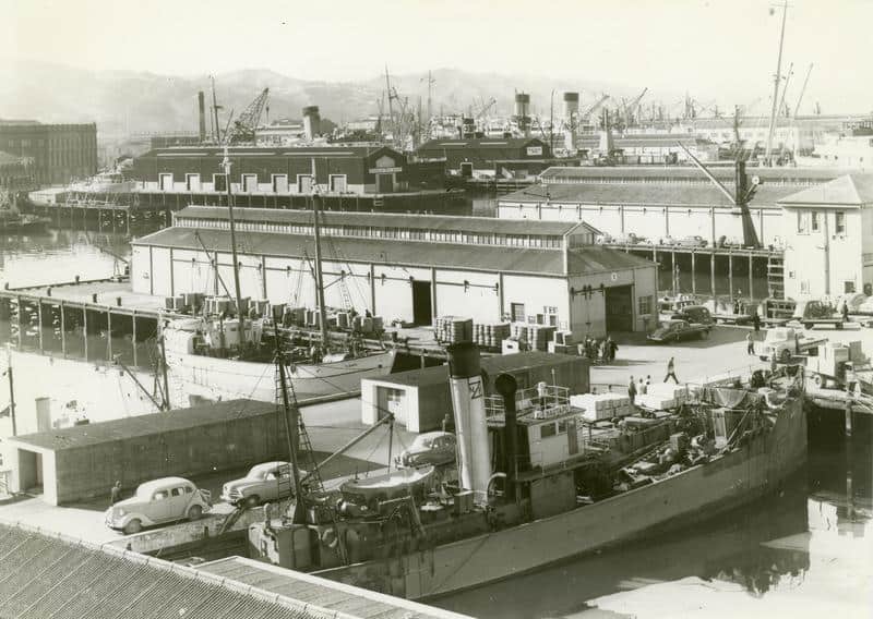 Black and white image of HAUTAPU at Queen's Wharf, Wellington.